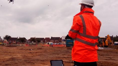 Land surveying team using drones in a consultancy service